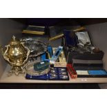 An large ornate plated basket sold along with a selection of boxed and loose flatware and cutlery