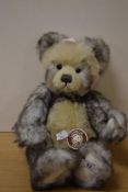 A long pile plush Charlie Bear teddy bear, 'Lewis', with brown collar and bell, measuring 34cm tall