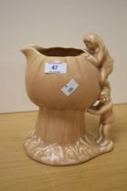 An Art Deco Sylvac Pixie and Mushroom vase, impressed 1969 mark to the underside, measuring 23cm