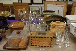 An assorted selection of wooden and glass kitchenalia including a Ceylon Tea box, trifle bowl,