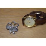 A gentleman's Sekonda wristwatch along with a floral design marcasite and pearl brooch.