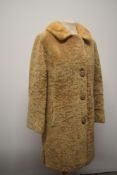A 1960s coat, having blonde mink collar, fully lined, medium size.