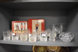 A collection of cut glass tumblers, sugar basin, vases etc, also included are some place mats of