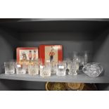 A collection of cut glass tumblers, sugar basin, vases etc, also included are some place mats of