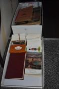 A collection of Bamforth WW1 postcards, a small quantity of assorted vintage stamp albums with loose