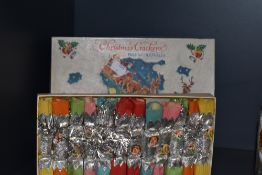 A boxed collection of mid-20th Century novelty Christmas crackers