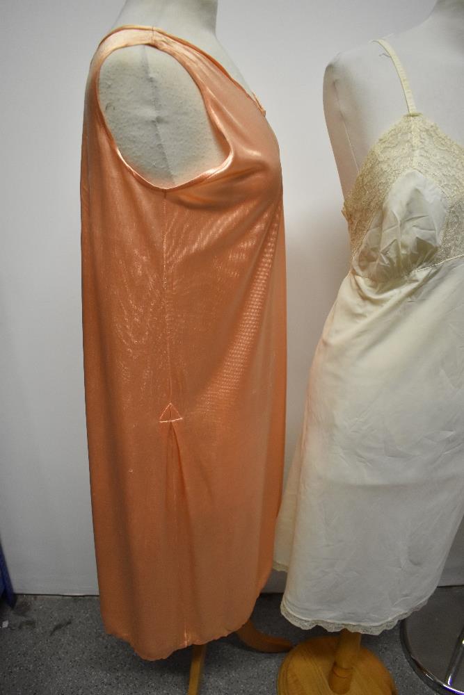 A selection of vintage lingerie, to include CC41 utility labelled knitted slip, 1930s peach slip and - Image 3 of 7