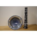 A 20th Century Chinese studio pottery bowl, having a blue glaze and reticulated fish border,