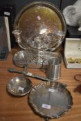 A selection of plated ware, pewter and similar, including coaster, candlestick, tray and a