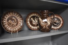 A selection of glazed ceramics, including jug with abstract cockerel depicted to centre.