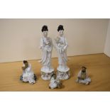 A pair of 20th Century Chinese porcelain geisha studies, measuring 26cm tall, and three Shiwan