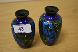 A pair of Chinese Cloisonne enamelled vases, measuring 9cm tall