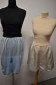 A pair of pale blue 1940s CC41 utility tap pants, having embroidery to legs and a pair of 1960s