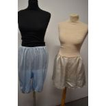 A pair of pale blue 1940s CC41 utility tap pants, having embroidery to legs and a pair of 1960s