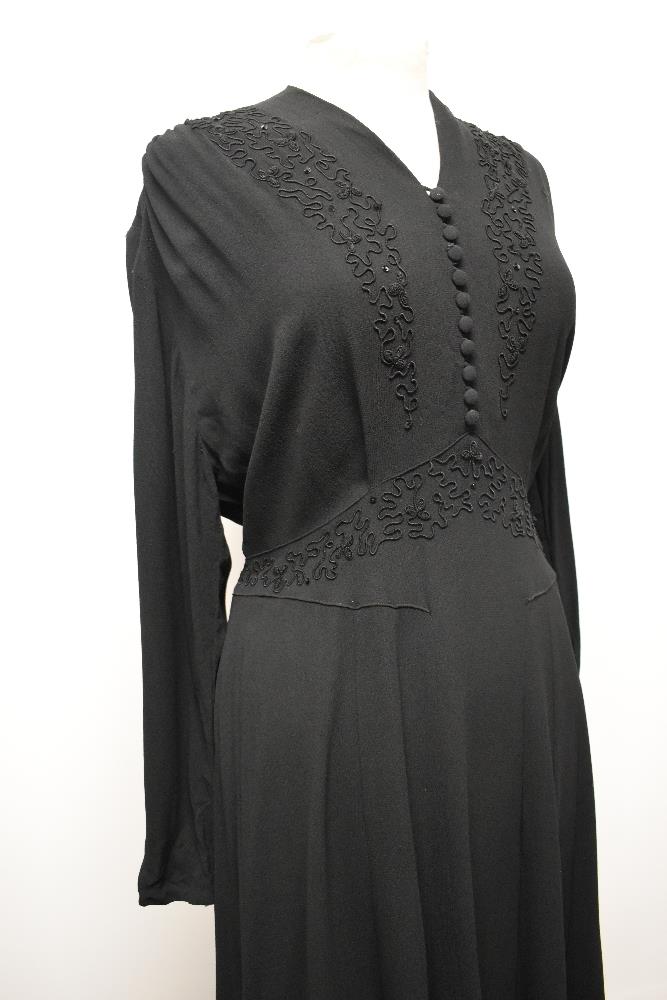 A late 1930s / 1940s black crepe day dress, having braiding to front with sequins, panelled skirt, - Image 5 of 8