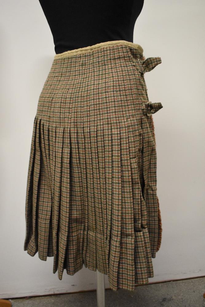 An antique kilt, some repair and nips in places, partially lined in a natural calico fabric. - Image 2 of 10