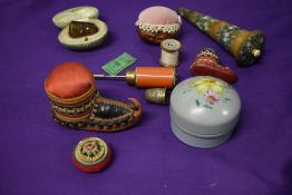 A selection of sewing collectables, including cut glass thimble in egg shaped green velvet box,