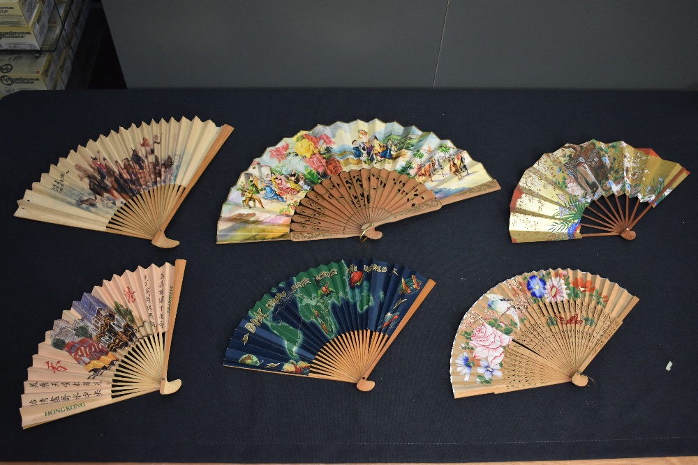 Six vintage paper fans, including BOAC and HongKong tramways collectable fans.