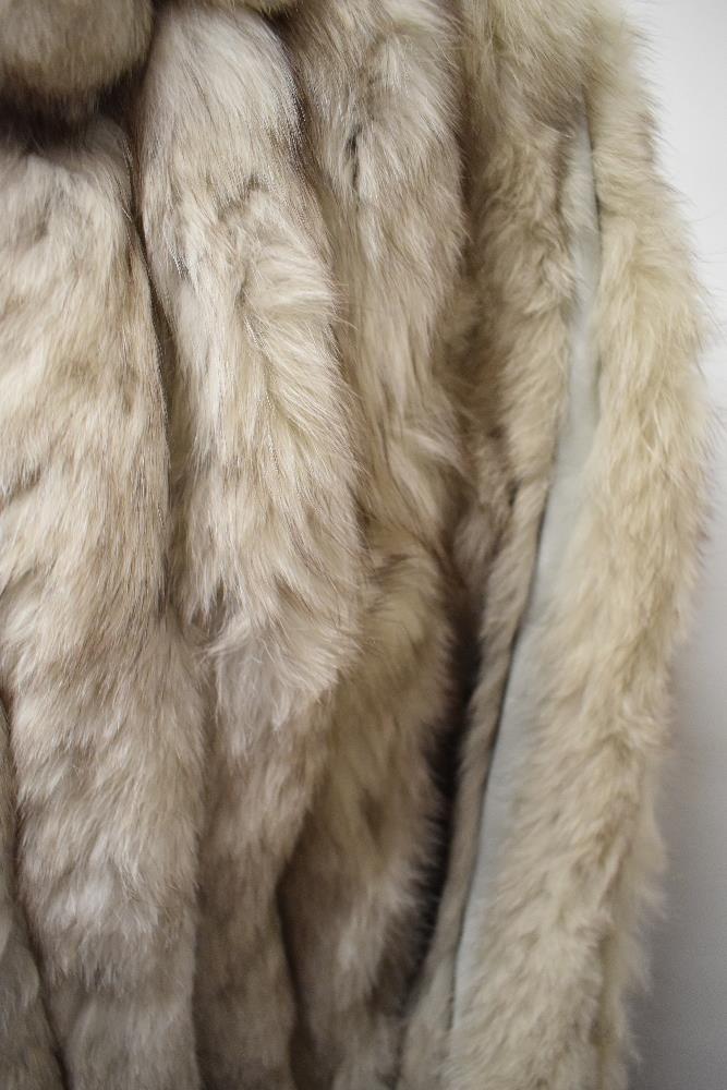 A vintage fox fur jacket, having leather banding interspersed with fur. - Image 2 of 4