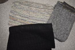 A selection of Linton skirt lengths and two large pieces of vintage wool.