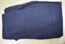 A very large piece of navy blue baize.