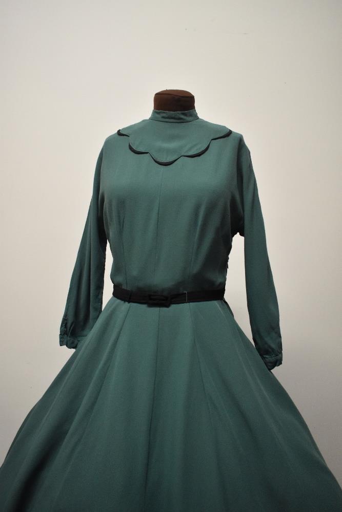 A 1950s green day dress, having black scalloped detail to bodice, high collar, long sleeves, full - Image 2 of 7