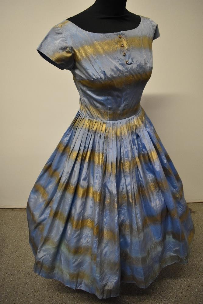 A 1950s blue and gold dress, having full pleated skirt, diamante accents to bodice and rear metal - Image 6 of 8