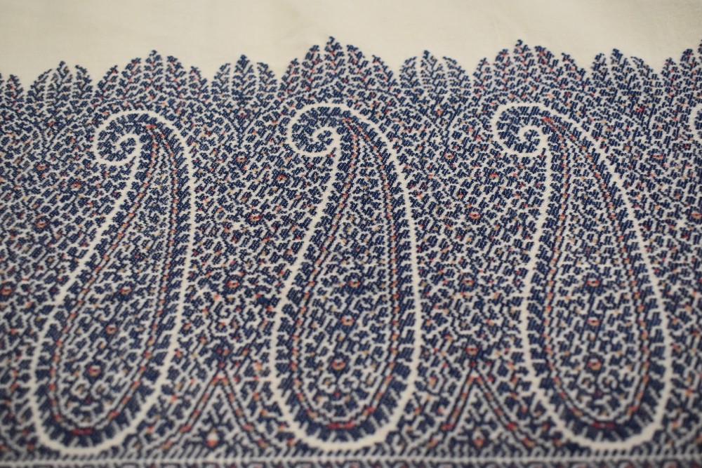 A mid Victorian woven Paisley Kirking crinoline shawl, with cream ground and blue, red and ochre - Image 6 of 10