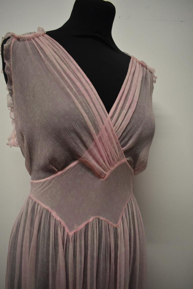 A floaty 1930s silk chiffon nightdress, in pale pink having delicate white floral pattern, cross - Image 8 of 13