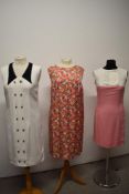 Three 1960s dresses, including pink and white fitted linen day dress and white linen dress with