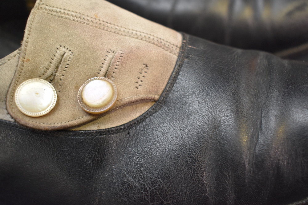 A pair of early 20th century black leather and cream suede shoes, having button decoration and stack - Image 4 of 8