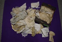 A box full of lace, crochet and similar, including modesty panel, doyleys, edgings etc.