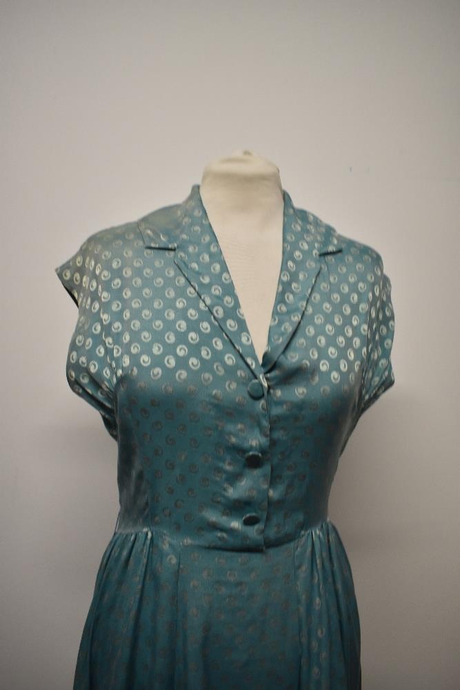 A late 1940s/early 50s day dress of sea foam green medium weight silk, having gathers to the - Image 2 of 8