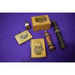 A selection of Mauchline ware and treen, including St Peters church Bournemouth needle case, Union