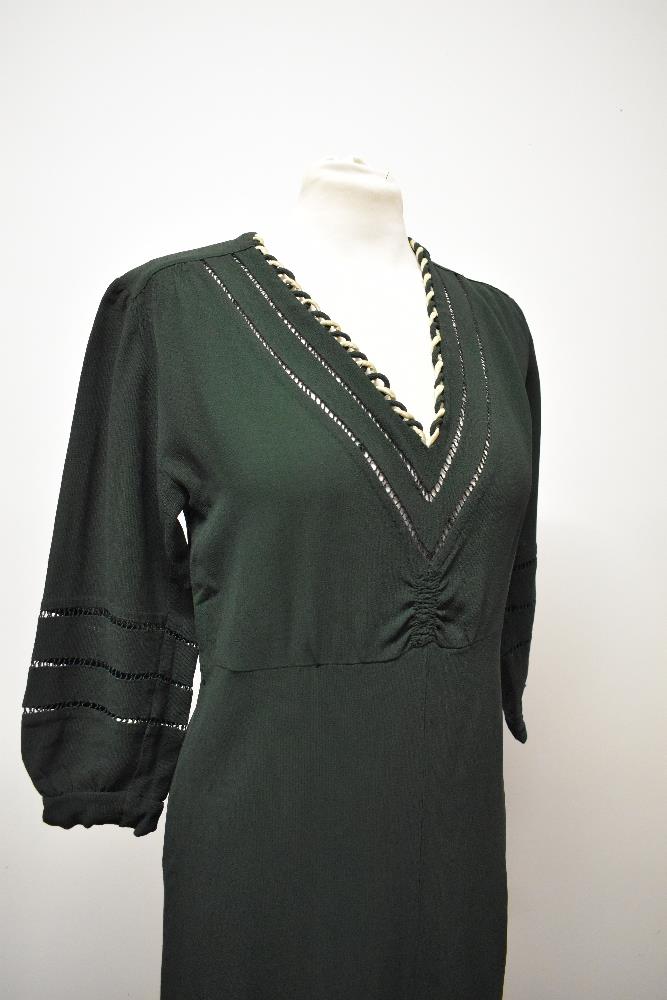 A 1930s bottle green day dress, having ladder work to sleeves and bodice, with cream twist detail to - Image 2 of 6