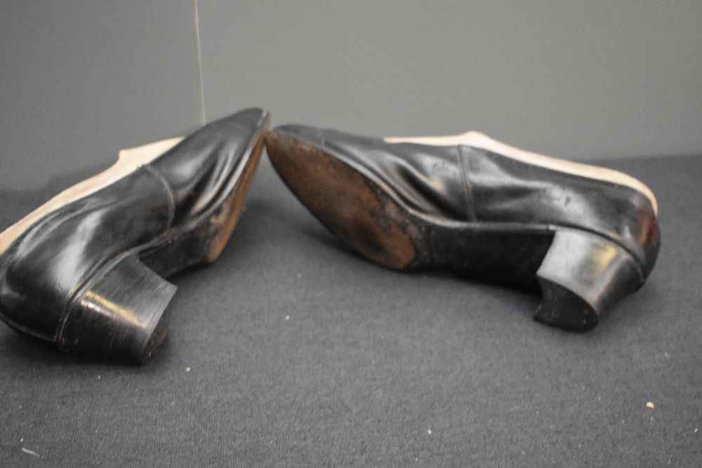 A pair of early 20th century black leather and cream suede shoes, having button decoration and stack - Image 7 of 8