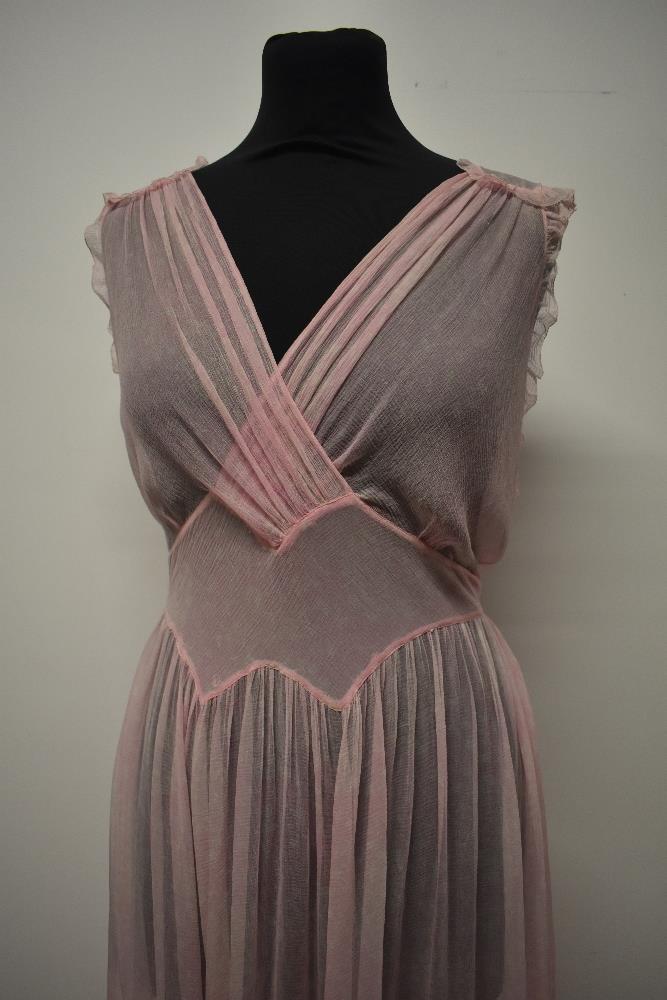 A floaty 1930s silk chiffon nightdress, in pale pink having delicate white floral pattern, cross - Image 7 of 13