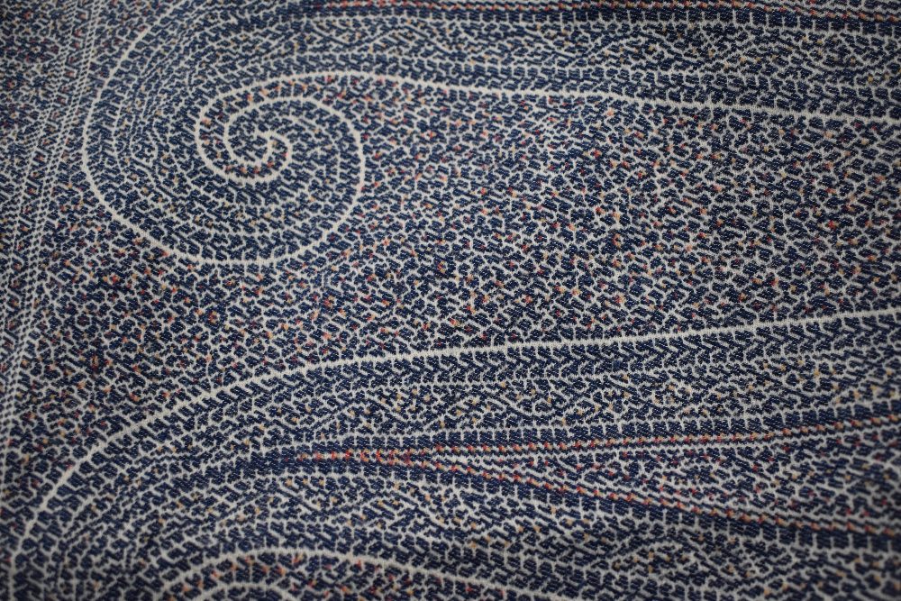A mid Victorian woven Paisley Kirking crinoline shawl, with cream ground and blue, red and ochre - Image 9 of 10