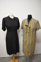 A vintage striped cotton day dress and a 1940s black crepe dress.