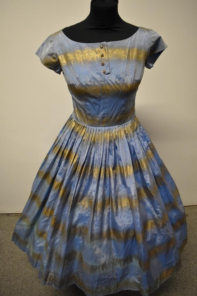 A 1950s blue and gold dress, having full pleated skirt, diamante accents to bodice and rear metal - Image 5 of 8