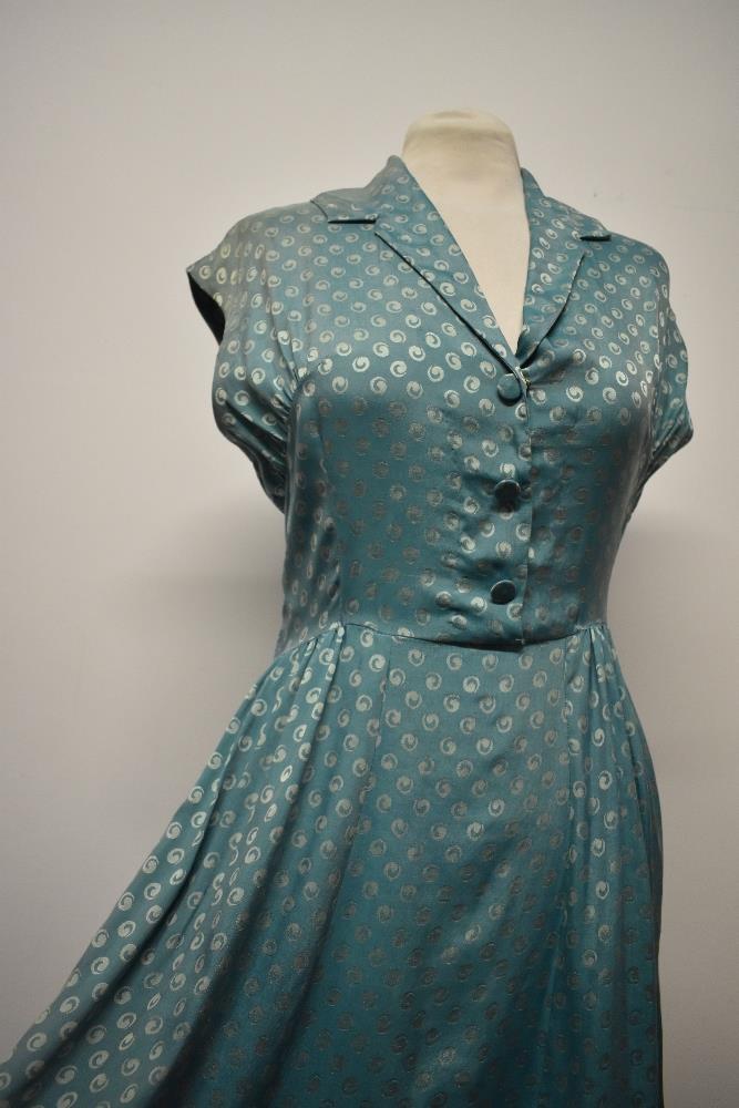 A late 1940s/early 50s day dress of sea foam green medium weight silk, having gathers to the - Image 3 of 8