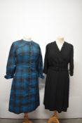 A late 1950s / 60s wiggle dress and a 1950s black day dress with pleated skirt.