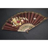 A large late Victorian / early Edwardian fan, having silk ground with beautiful basket of flowers