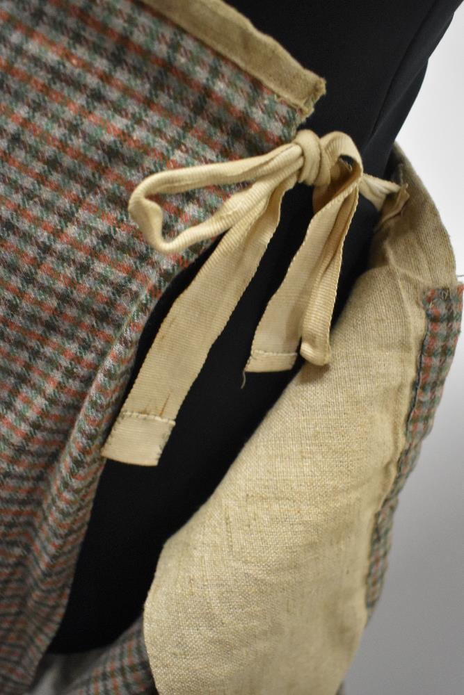 An antique kilt, some repair and nips in places, partially lined in a natural calico fabric. - Image 9 of 10