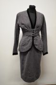 A beautifully tailored deep heather coloured textured wool 1940s skirt suit, having black velvet