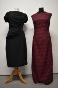 A 1950s black wiggle dress with mahogany toned mink trim and a floor length 1960s evening gown.
