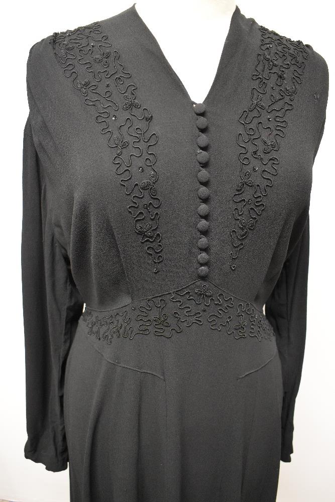 A late 1930s / 1940s black crepe day dress, having braiding to front with sequins, panelled skirt, - Image 3 of 8