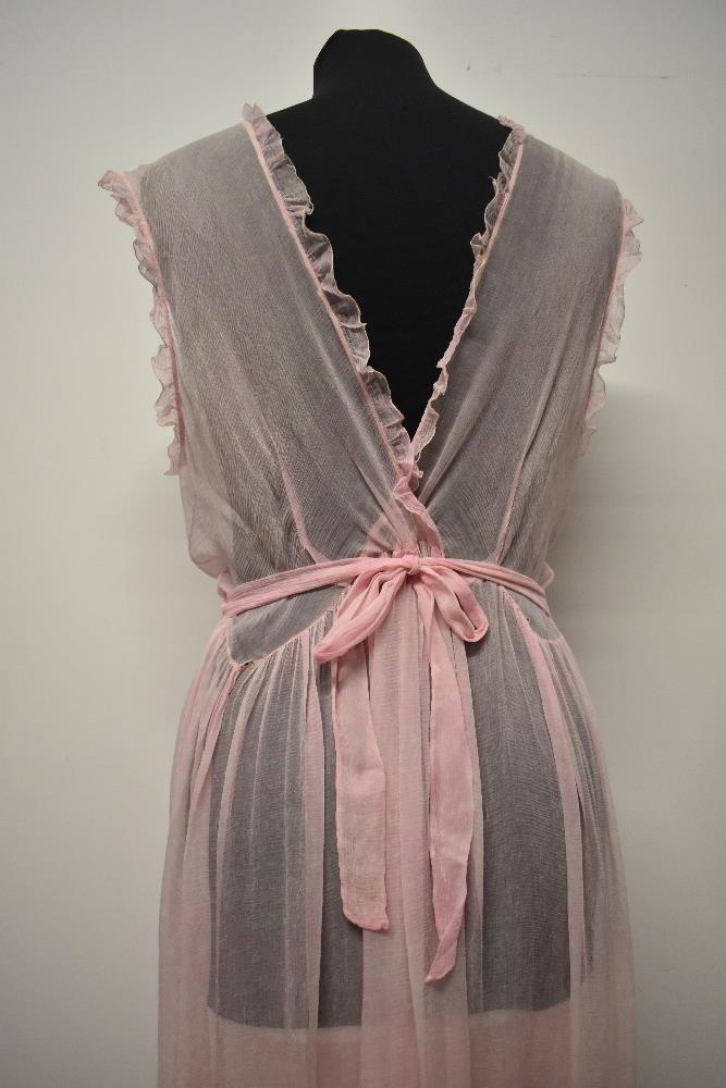 A floaty 1930s silk chiffon nightdress, in pale pink having delicate white floral pattern, cross - Image 10 of 13