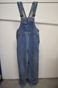 A pair of vintage denim dungarees.