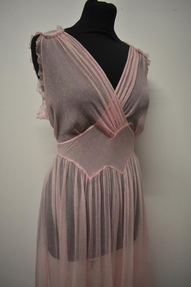 A floaty 1930s silk chiffon nightdress, in pale pink having delicate white floral pattern, cross - Image 4 of 13